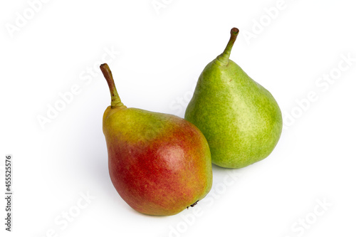 Two pears on a white background. Red-green ripe pear. Green juicy pear