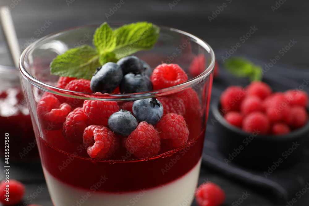Delicious panna cotta with berries in glass dish, closeup Delicious panna cotta with berries in glass dish, closeup