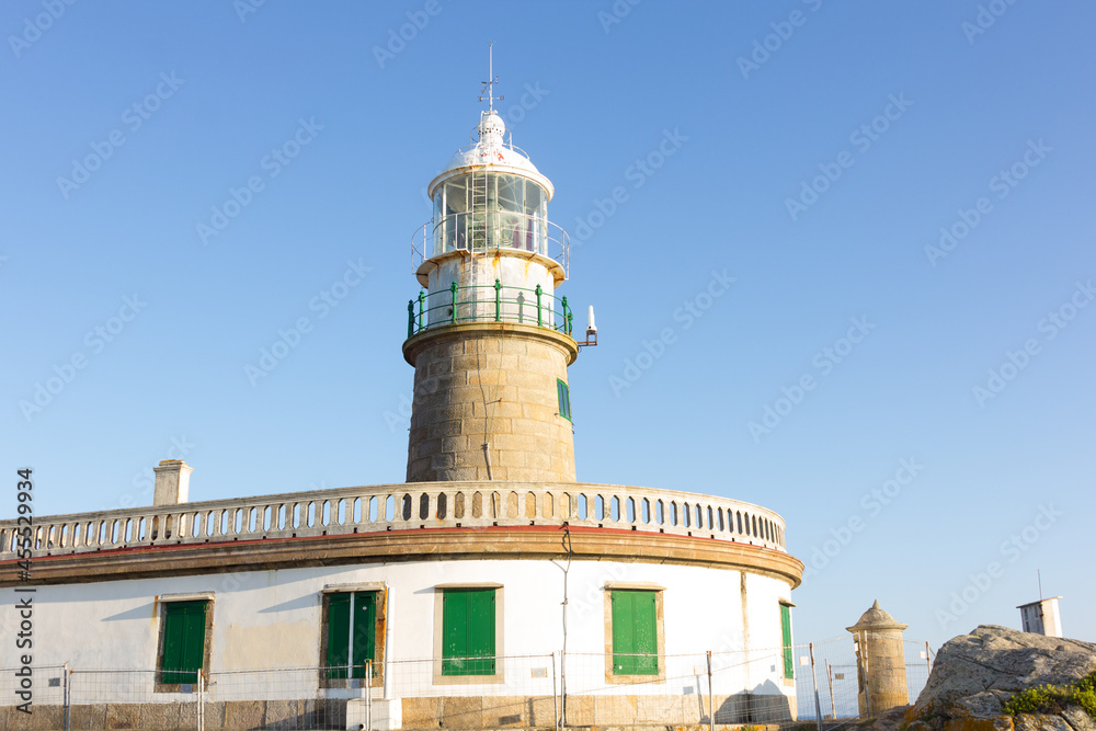 Corrubedo lighthouse in the Atlantic Ocean, Galicia, spain