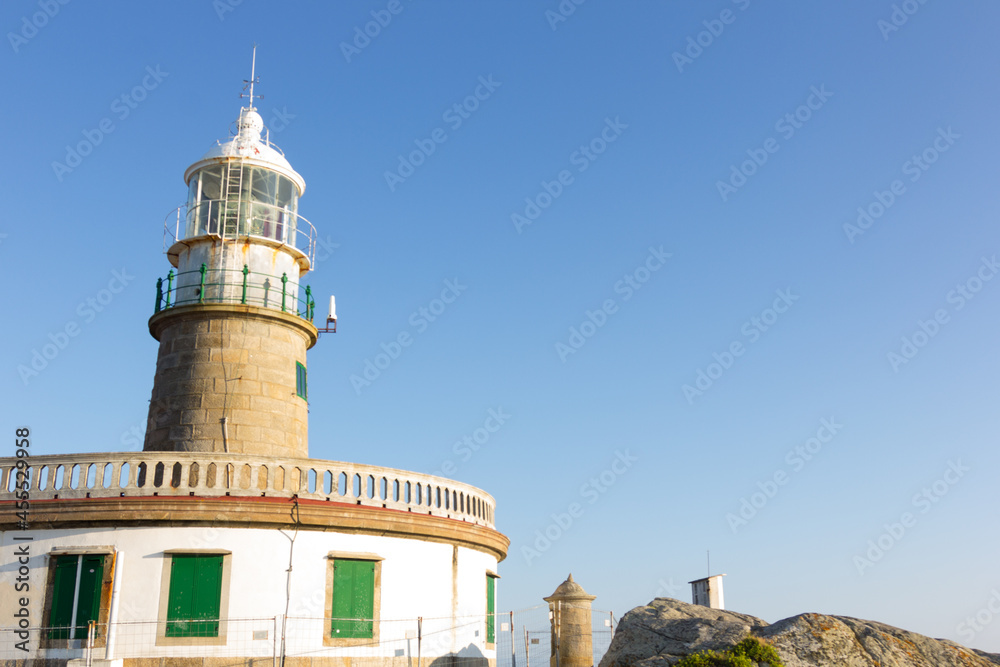 Corrubedo lighthouse in the Atlantic Ocean, Galicia, spain