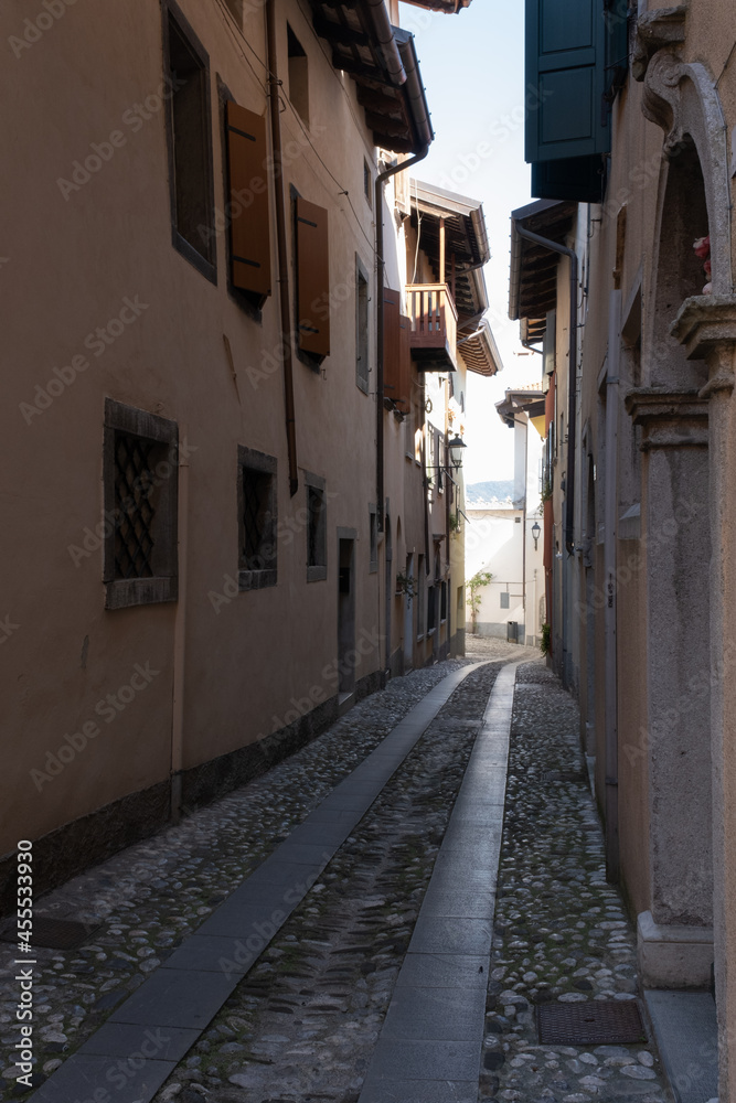 Cividale del Friuli (Udine), Italy - September 5, 2021: North Italy Life in the center of the lombard medieval city. Walking through narrow streets and walls. Sunny summer day. Selective focus Cividale del Friuli (Udine), Italy - September 5, 2021: North Italy Life in the center of the lombard medieval city. Walking through narrow streets and walls. Sunny summer day. Selective focus