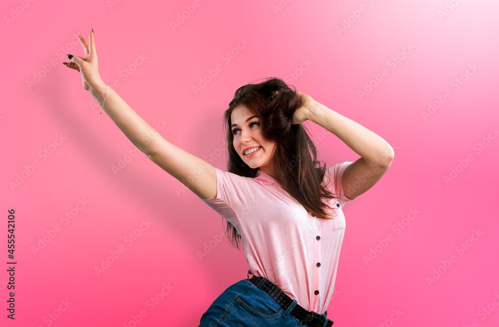 young pretty woman cute face expression posing on a bright background young pretty woman cute face expression posing on a bright background
