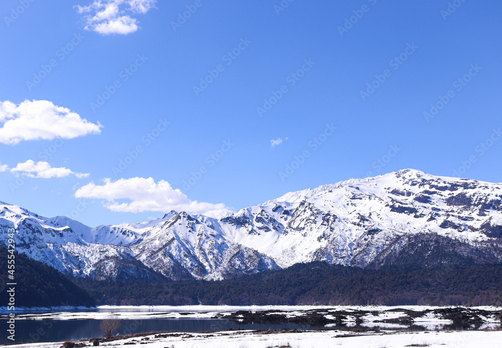 landscape of snow covered mountains in chilean winter 