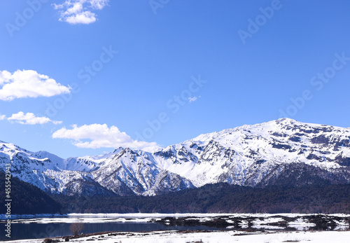 landscape of snow covered mountains in chilean winter 