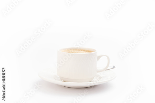 Cup of coffee closeup on white background