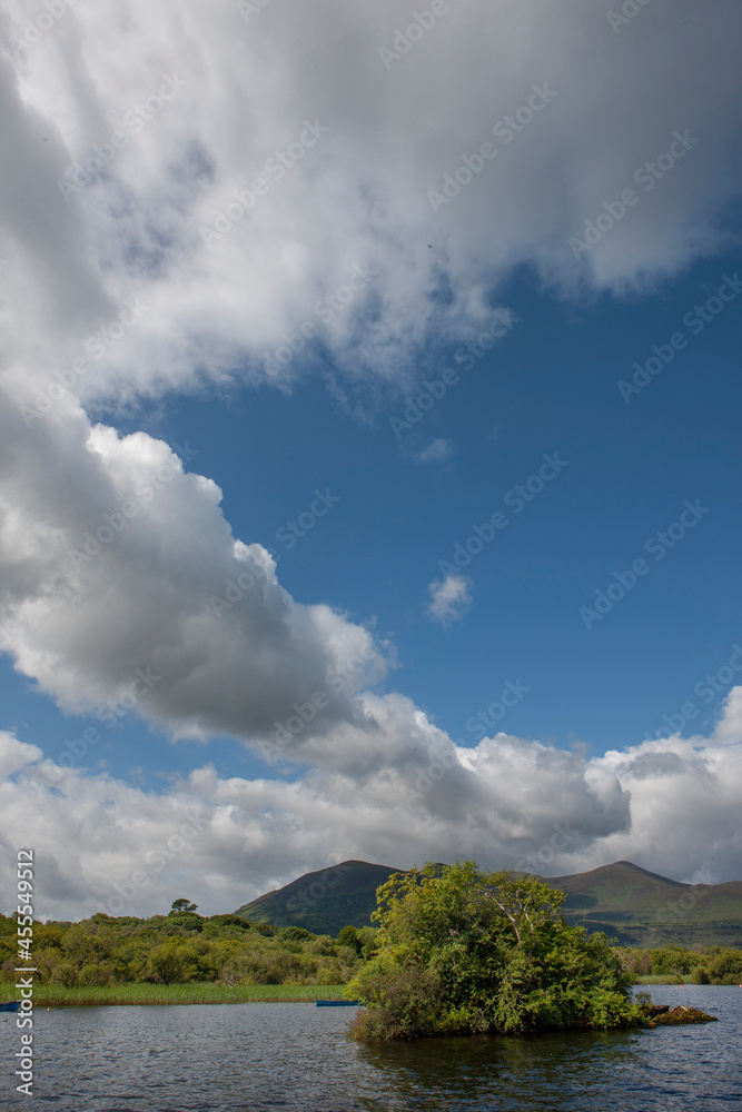 Lake at Ross castle Killarney Ireland. Blue sky and clouds.