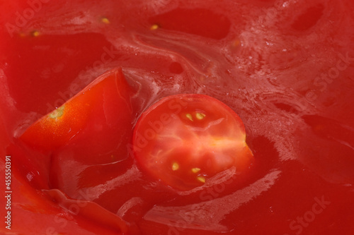 Red grocery background of tomato juice