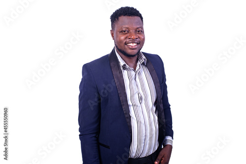 handsome young businessman smiling at camera.