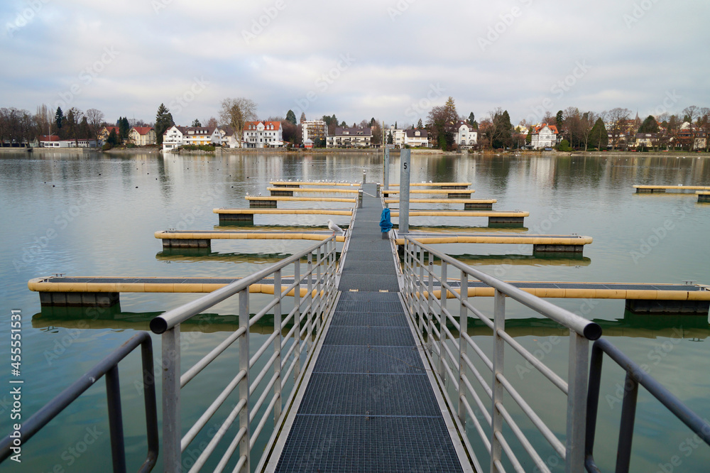 A gloomy winter day at the beautiful harbour of Lindau city on lake Constance (Germany)	
