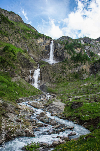 A beautiful waterfall of Gstaad moutains in the heart of Switzerland