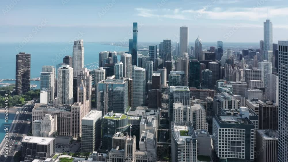 4K aerial overview of Chicago Downtown. Beautiful business and residential buildings at the frontline. Expensive apartments in the skyscrapers with scenic Michigan lake view in Illinois, USA