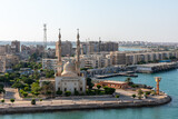 An Egyptian Mosque and maritime port at the city of Tawfiq (Suburb of Suez), on the southern end of the Suez Canal before exiting into the Red Sea. 