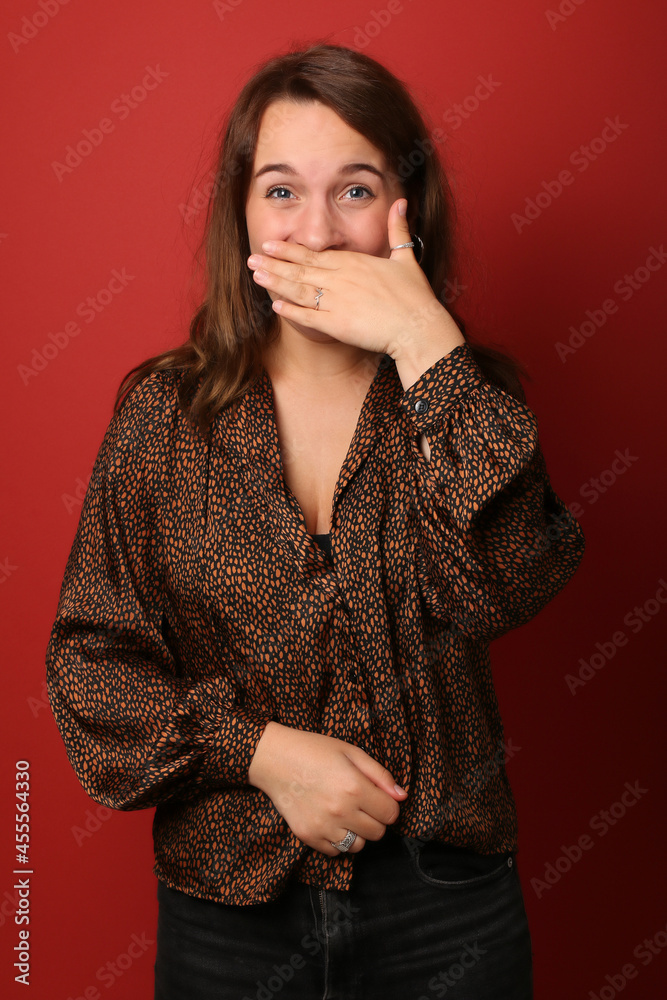 Beautiful woman in front of a background Beautiful woman in front of a background