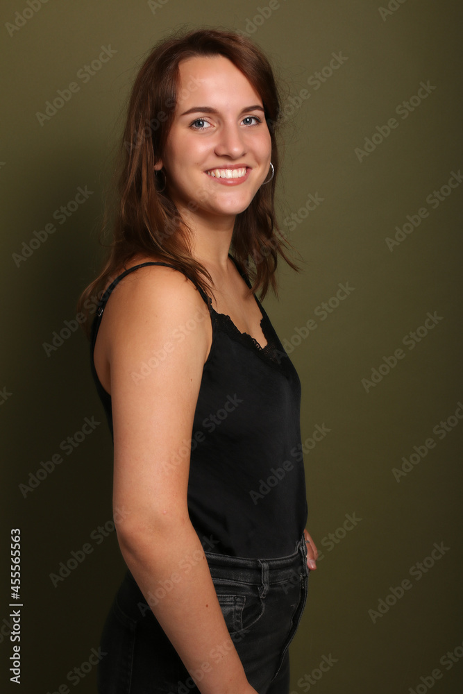 Beautiful woman in front of a background Beautiful woman in front of a background