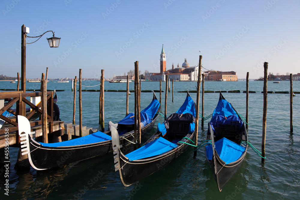 Gondolas in St. Mark's square with Saint George's island, Venice, Italy
