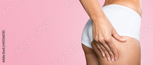 Wallpaper Mural woman wearing white lingerie on a colored background Torontodigital.ca