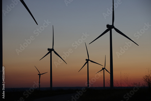 Wind Turbines producing energy at sunset