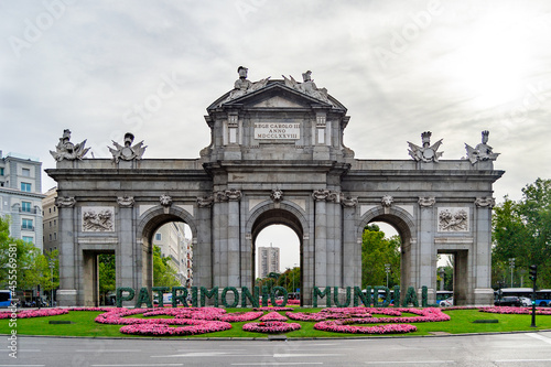MADRID, SPAIN - SEPTEMBER 7, 2021. Puerta de Alcalá, located in the center of the roundabout of the Plaza de la Independencia, next to the Retiro Park. World Heritage architecture, in Spain. Europe.
