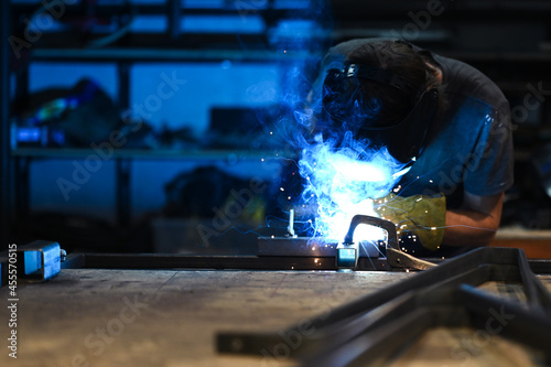 Welding with blue sparks