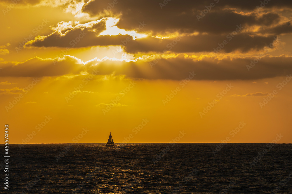 Fototapeta premium A Aailboat at Sunset Time