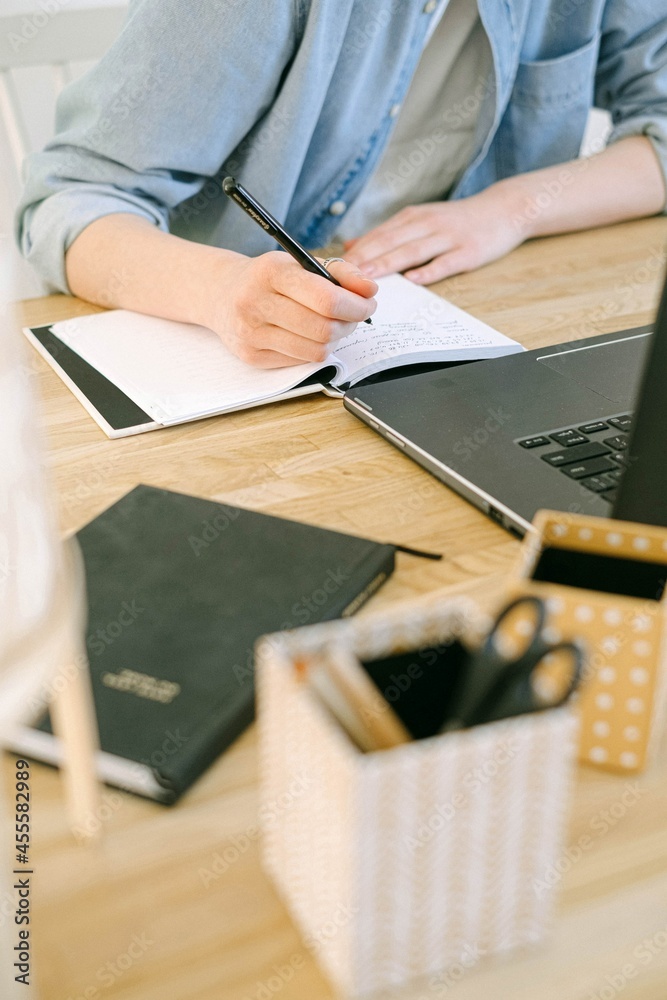 custom made wallpaper toronto digitalMan writing a note on note book sitting at desk