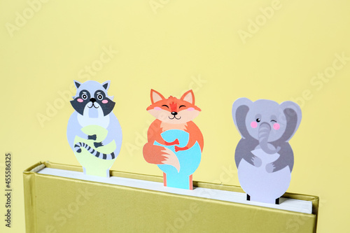 Cute bookmarks with book on...