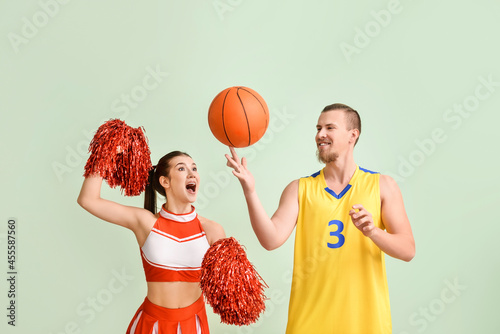 Cheerleader and basketball ...
