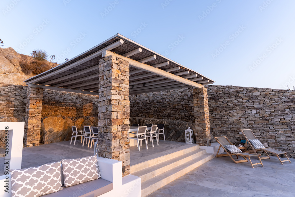 Trendy outdoor patio pergola shade structure, awning and patio roof, garden lounge and chairs. Trendy outdoor patio pergola shade structure, awning and patio roof, garden lounge and chairs.