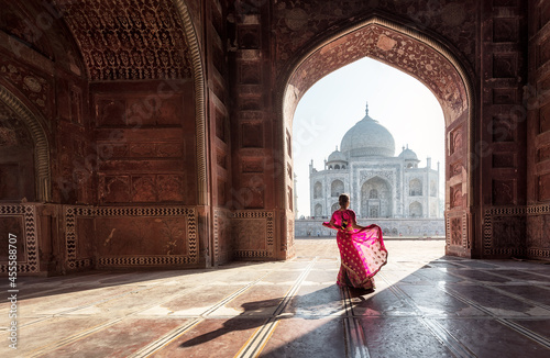 Woman in pink sari inside Taj Mahal, India photo