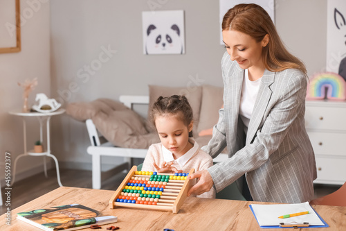 Female psychologist working...