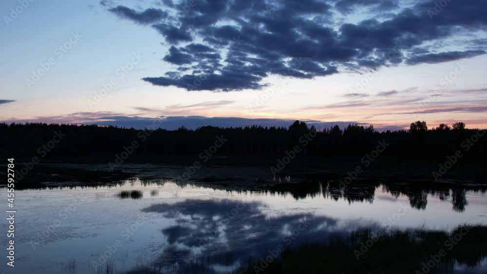 Flight over the lake and forest in the evening. summer sunset over the lake Flight over the lake and forest in the evening. summer sunset over the lake