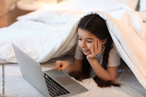 Cute girl watching cartoons...