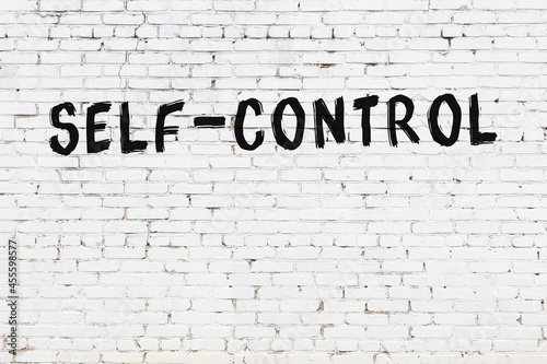 Bilde på lerret Inscription self-control painted on white brick wall