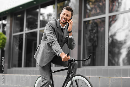 Businessman with mobile pho...