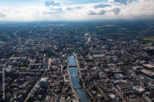 Photography Aerial view of skyline of Dublin with river flowing with bridge connecting two s