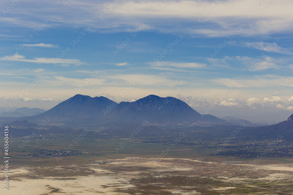 blue mountain landscape with fog