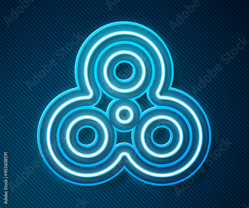 Glowing neon line Fidget spinner icon isolated on blue background. Stress relieving toy. Trendy hand spinner. Vector