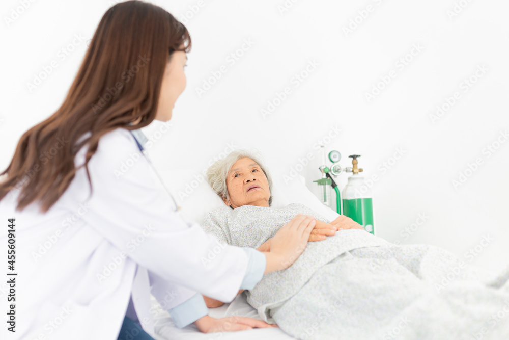 close up patient, doctor screening old asian patient, elderly health check up , they talk about symptoms together, doctor holding hand of patient, palliative care close up patient, doctor screening old asian patient, elderly health check up , they talk about symptoms together, doctor holding hand of patient, palliative care
