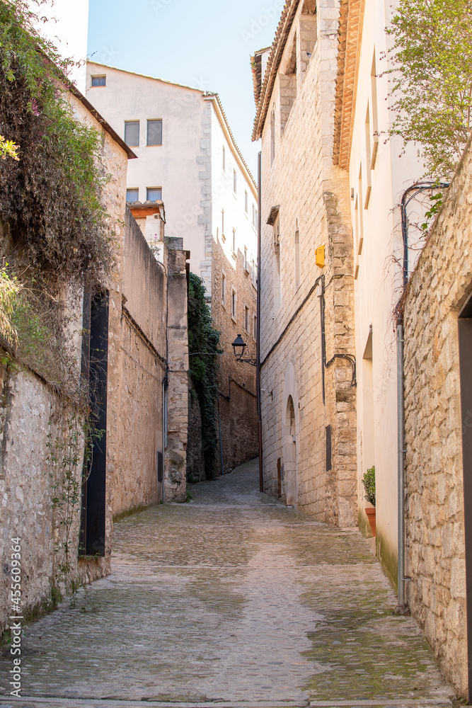 Deserted stone street in the old town of Girona