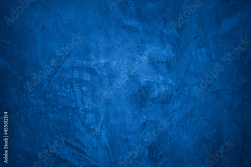 Old wall pattern texture cement blue dark abstract  blue color design are light with black gradient background.