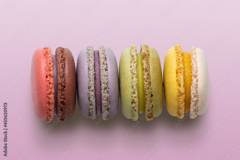 Cake macaron or macaroon on pink background Cake macaron or macaroon on pink background