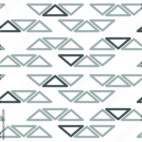 Vector image. A graphic resource for printing wallpapers, curtains, notebook covers, notebooks. Textile typography. Millet print, the main element is black and gray semi-transparent triangle.