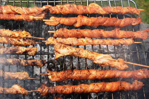 Roasting Frigarui ,skewers,on an outdoors grill