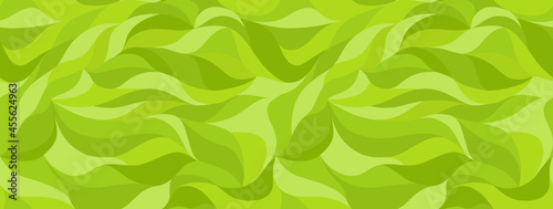 Green grass stylized cartoon background. Curly waves tracery, curved lines. Green leaf, seamless texture, abstract petals pattern. Vector wallpapers for printing on paper or fabric.