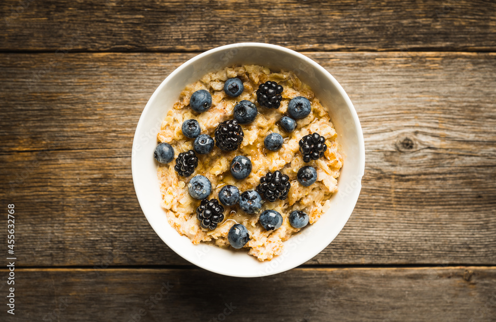 Oatmeal porridge with berries. Selective focus. Oatmeal porridge with berries. Selective focus.