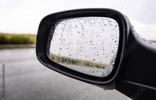 Rear view mirror with raindrops © celiafoto