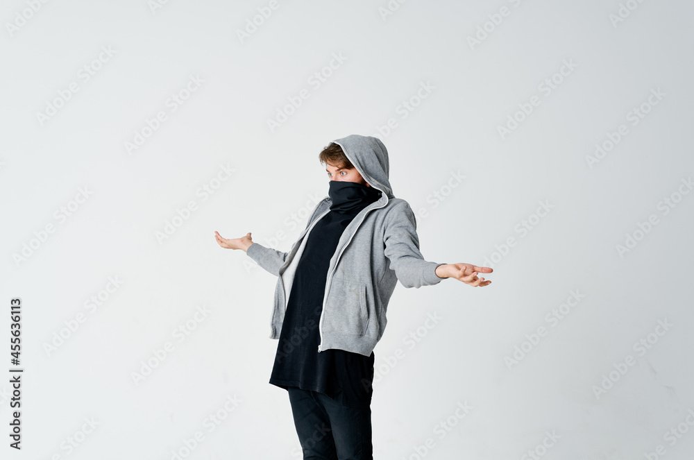 masked hooded man hiding his face stealing emotions anonymity masked hooded man hiding his face stealing emotions anonymity