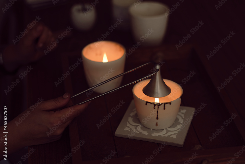 candle turned off putting off fire. Stainless steel put out candle