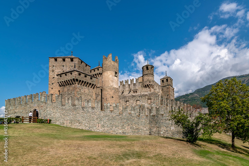 The ancient castle of Fénis, Aosta Valley, Italy, in the summer season photo