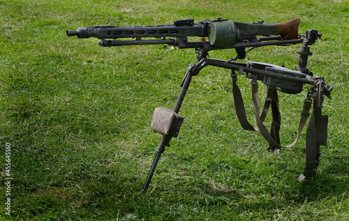 The MG 34 is a German recoil-operated air-cooled machine gun, first tested in 1929, introduced in 1934. MG42 introduced later. pressed steel manufacture. photo